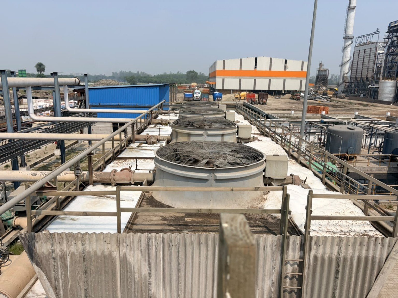 Cooling tower fan deck and industrial piping